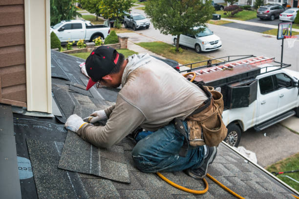 Professional Roof Replacement technician working in Rock Island, TX